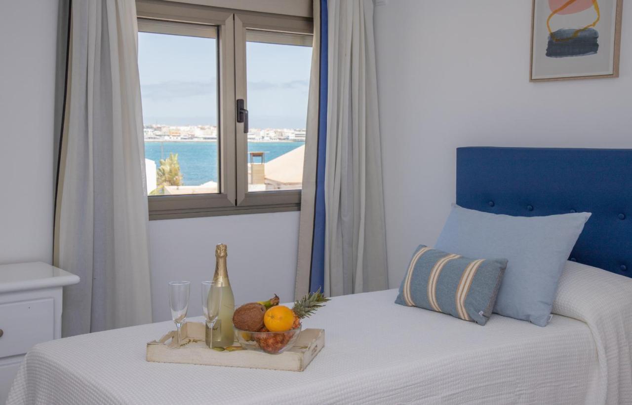 Apartment Holiday 5 Beachfront Corralejo By Holidays Home Bagian luar foto